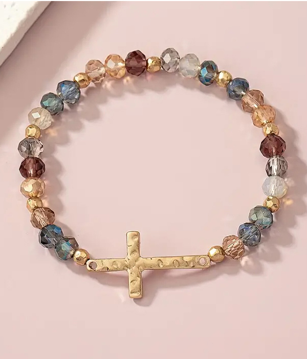 Cross pendant and facet bead stretch bracelet