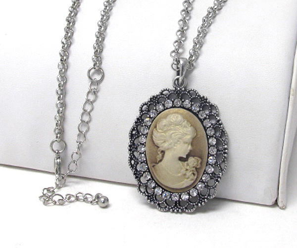 Crystal and metal filigree cameo pendant necklace