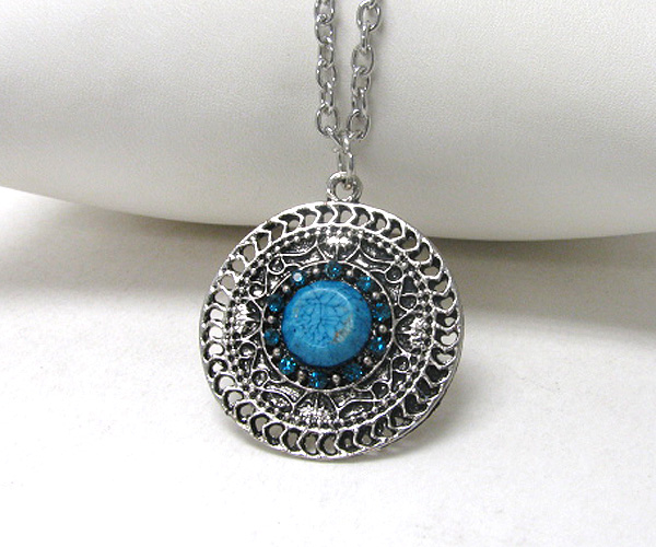 Crystal and turquoise center metal filigree pendant necklace