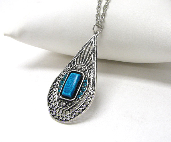 Crystal and turquoise center metal filigree pendant necklace