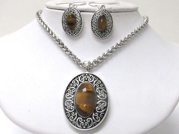 Natural stone and textured metal deco oval shape pendant necklace and earring set