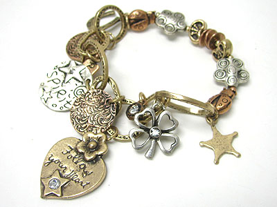 Tri tone metal heart and multi cahrm dangle bracelet