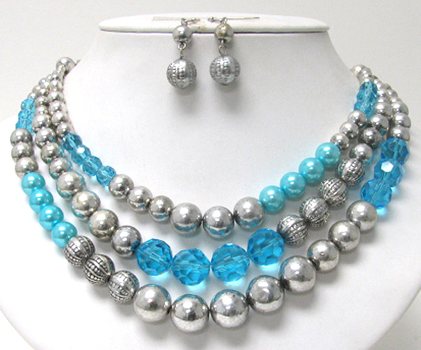 Multi material ball link three layered necklace earring set