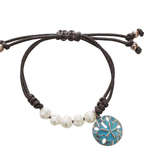 Freshwater pearl and sand dollar charm pull tie bracelet