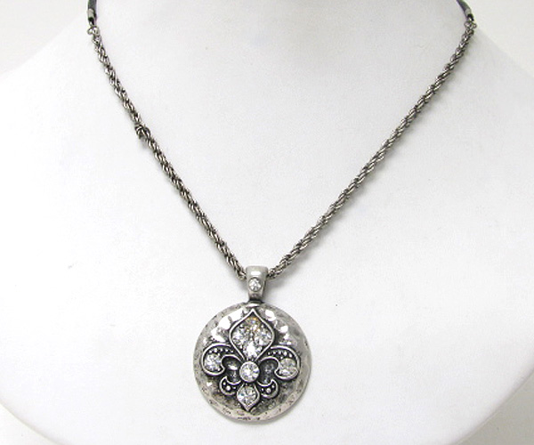 Crystal fluer de lis on hammered disk pendant necklace