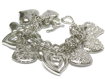 Multi detailed filigree heart charm toggle bracelet