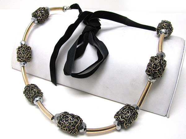 Multi wired metal ball and bar ribbon tied long necklace 