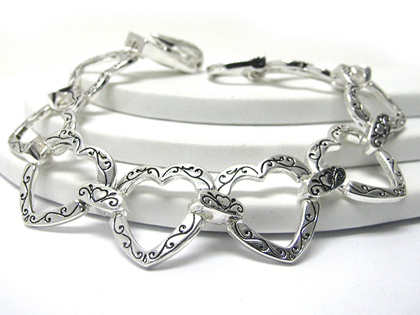 Designer inspired textured metal heart link magnetic clasp bracelet