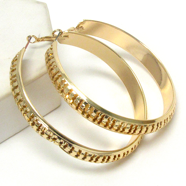 Metal filigree hoop earring