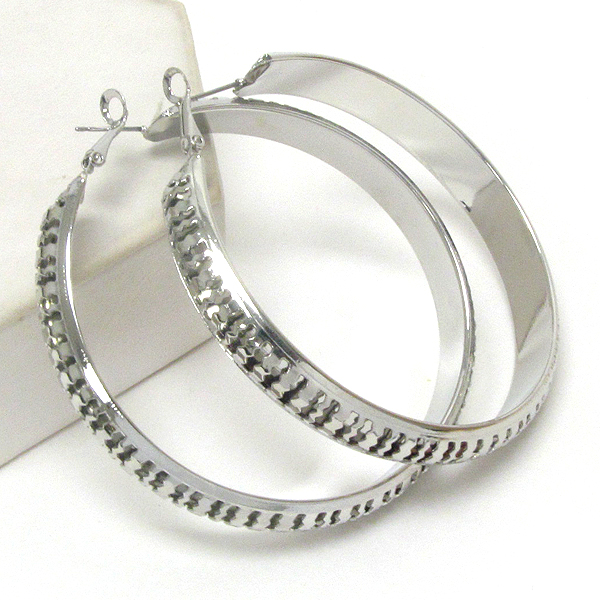 Metal filigree hoop earring