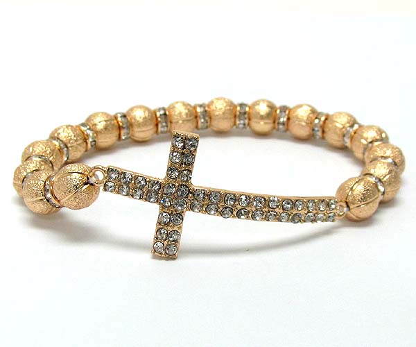 Crystal metal cross with multi rondelle crystal and textured sandy metal balls on stretch barcelet