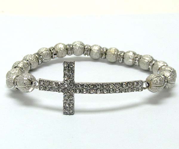 Crystal metal cross with multi rondelle crystal and textured sandy metal balls on stretch barcelet