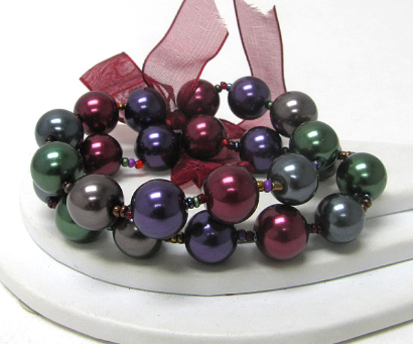 Ribbon tie multi pearl link double stretch bracelet