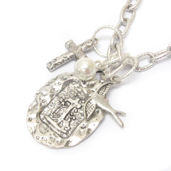 Vintage metal cross and bird chain necklace