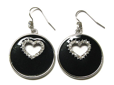 Epoxy circle with punched out heart encircled by crystal earring