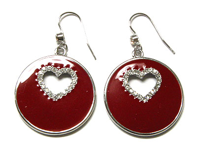 Epoxy circle with punched out heart encircled by crystal earring