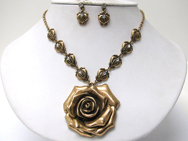 Metal sculpure flower medallion necklaceearring set