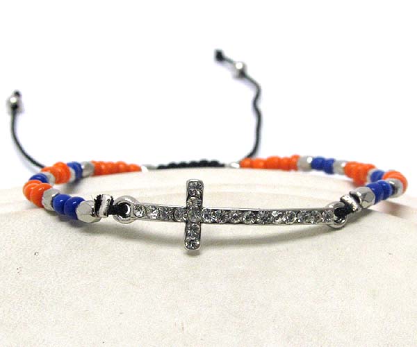 Crystal cross and multi seed beads on braided yarn friendship bracelet