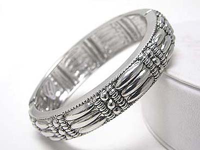 Textured metal hinge bangle