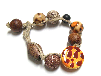 Burnt wood beads sinamay and raffia wirapped wood beads robles wood beads in hemp cord bracelet