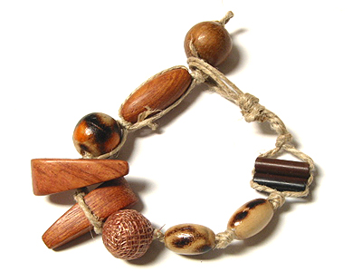 Burnt wood beads sinamay wrapped wood beads mdc wood beads in hemp cord bracelet