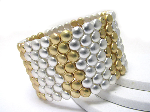 Small metal disk woven stretch bracelet