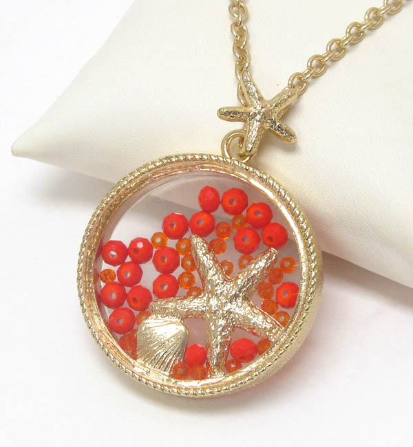 Starfish and floating bead in glass disk pendant necklace