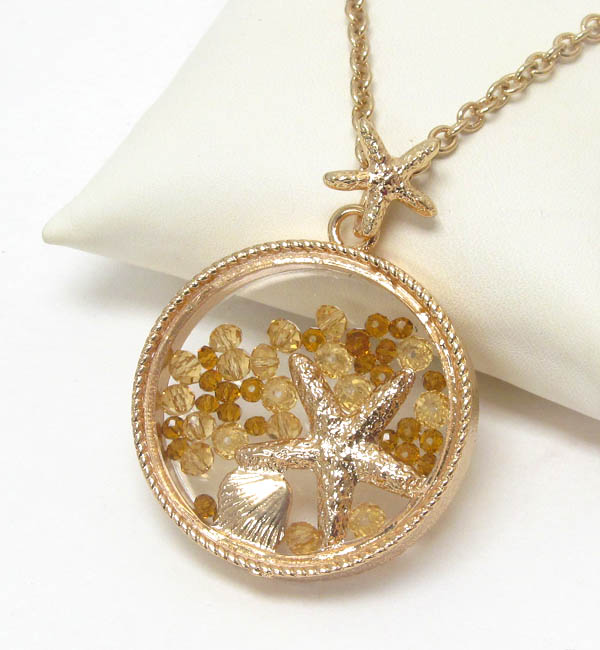 Starfish and floating bead in glass disk pendant necklace