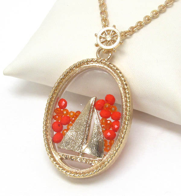 Sail boat and floating bead in glass oval pendant necklace