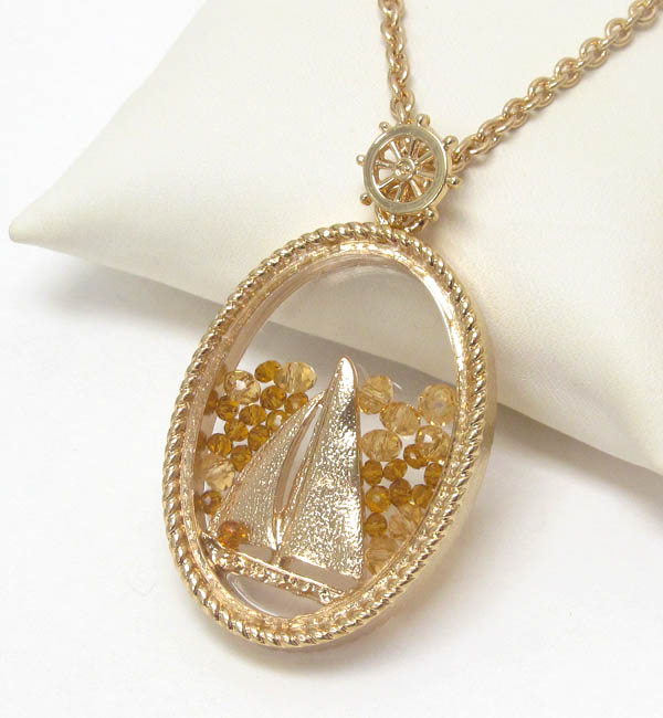 Sail boat and floating bead in glass oval pendant necklace