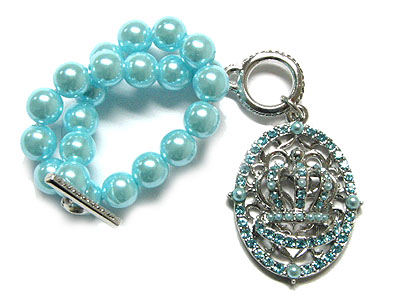 Designer style crystal crown charm and pearl beads toggle bracelet