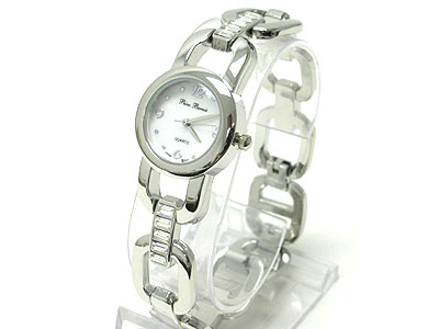 Small round face barguette crystal and metal link watch