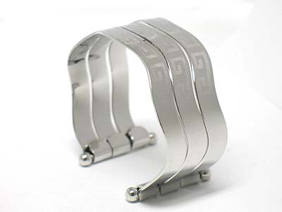 Triple row waved metal cuff bangle