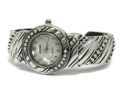 Pewter metal bangle watch - mop background