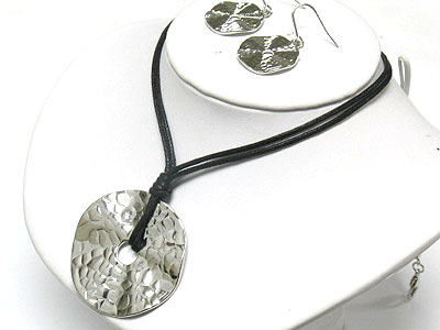 Distorted metal round pendant and cord necklace and earring set