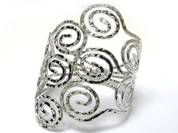 Tall hammered swirl metal  hainge bangle