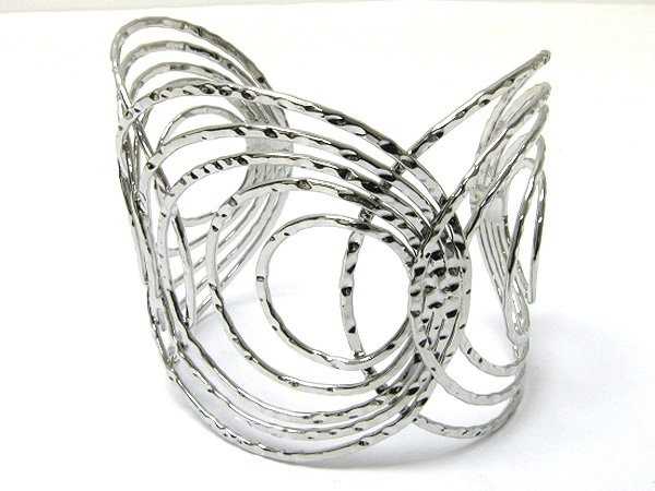 Hammered swirl metal cuff bangle