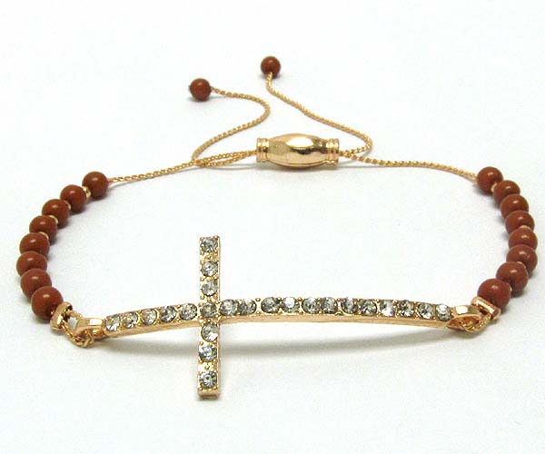 Crystal metal cross with acryl seed beads on metal cord friendship bracelet