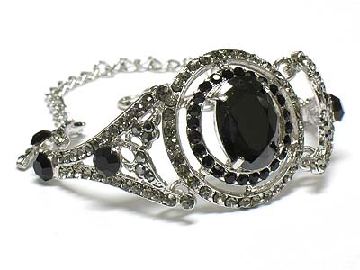 Boutique style cubic eye crystal deco fold over type bracelet