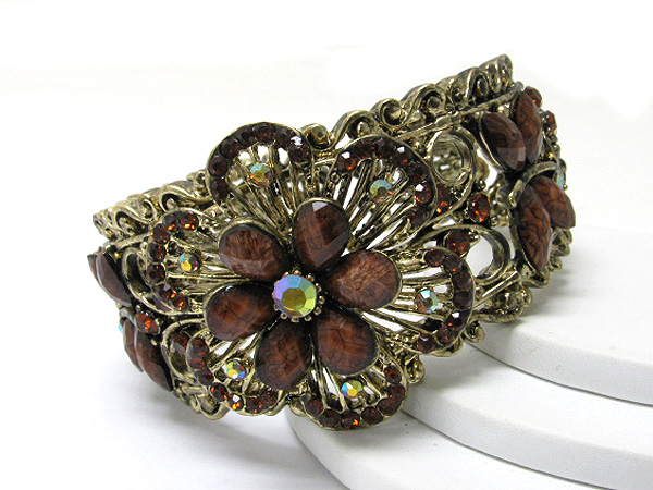 Crystal and acryl deco flower and butterfly accent metal hinge bangle