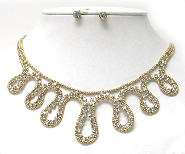 Crystal and metal wave line necklace earring set