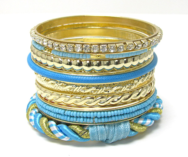 Multi row mishmash spring bangle set