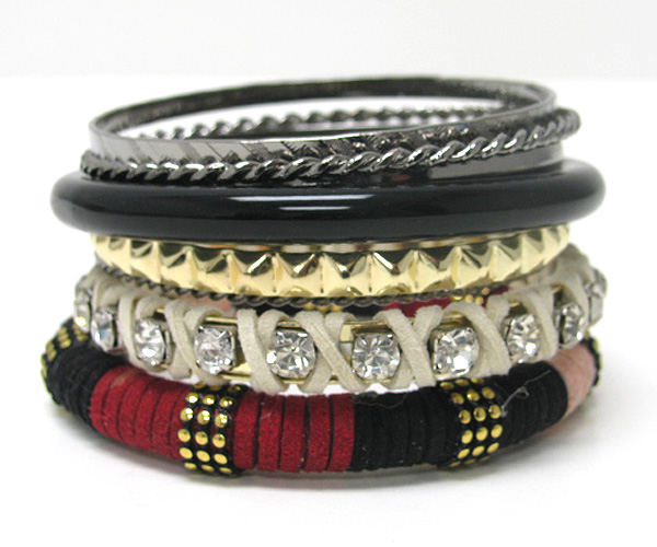 Multi row mishmash spring bangle set