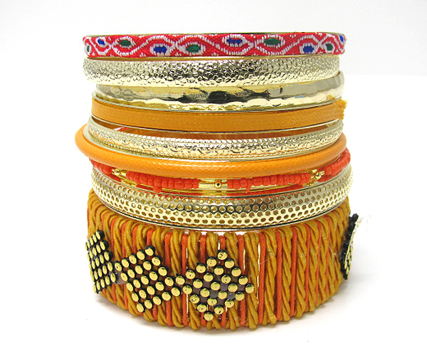 Multi row mishmash spring bangle set