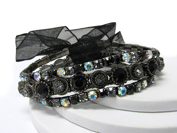 Ribbon tied triple line crystal stretch bracelet