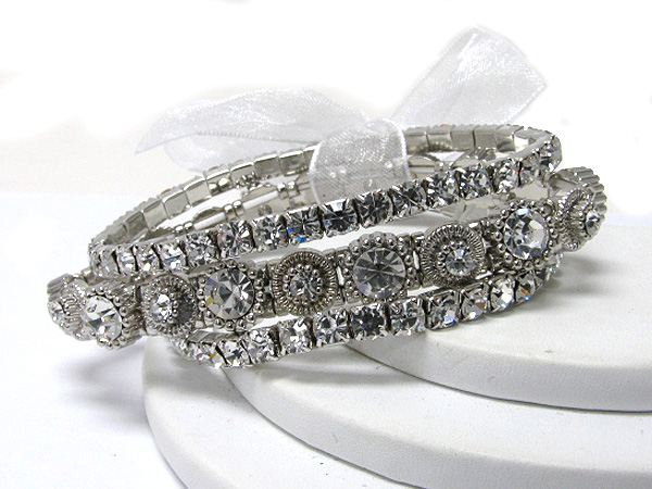 Ribbon tied triple line crystal stretch bracelet