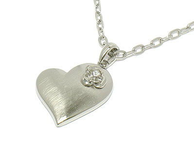 Crystal flower accent metal heart necklace