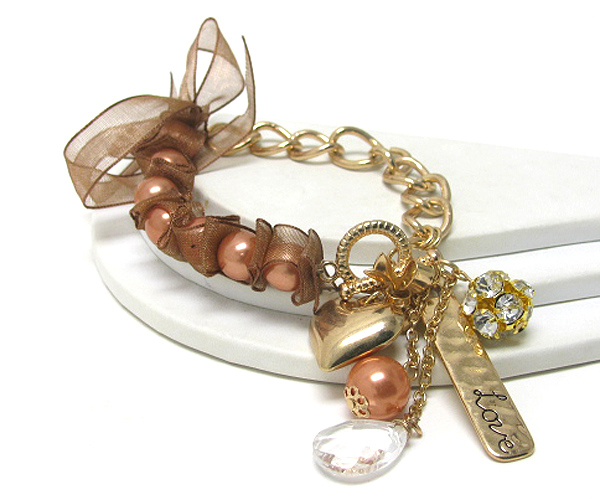 Multi charm ribbon tied pearl and metal chain ling bracelet