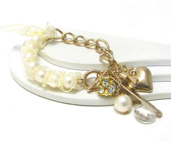 Multi charm ribbon tied pearl and metal chain ling bracelet