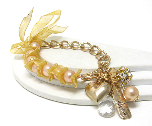 Multi charm ribbon tied pearl and metal chain ling bracelet